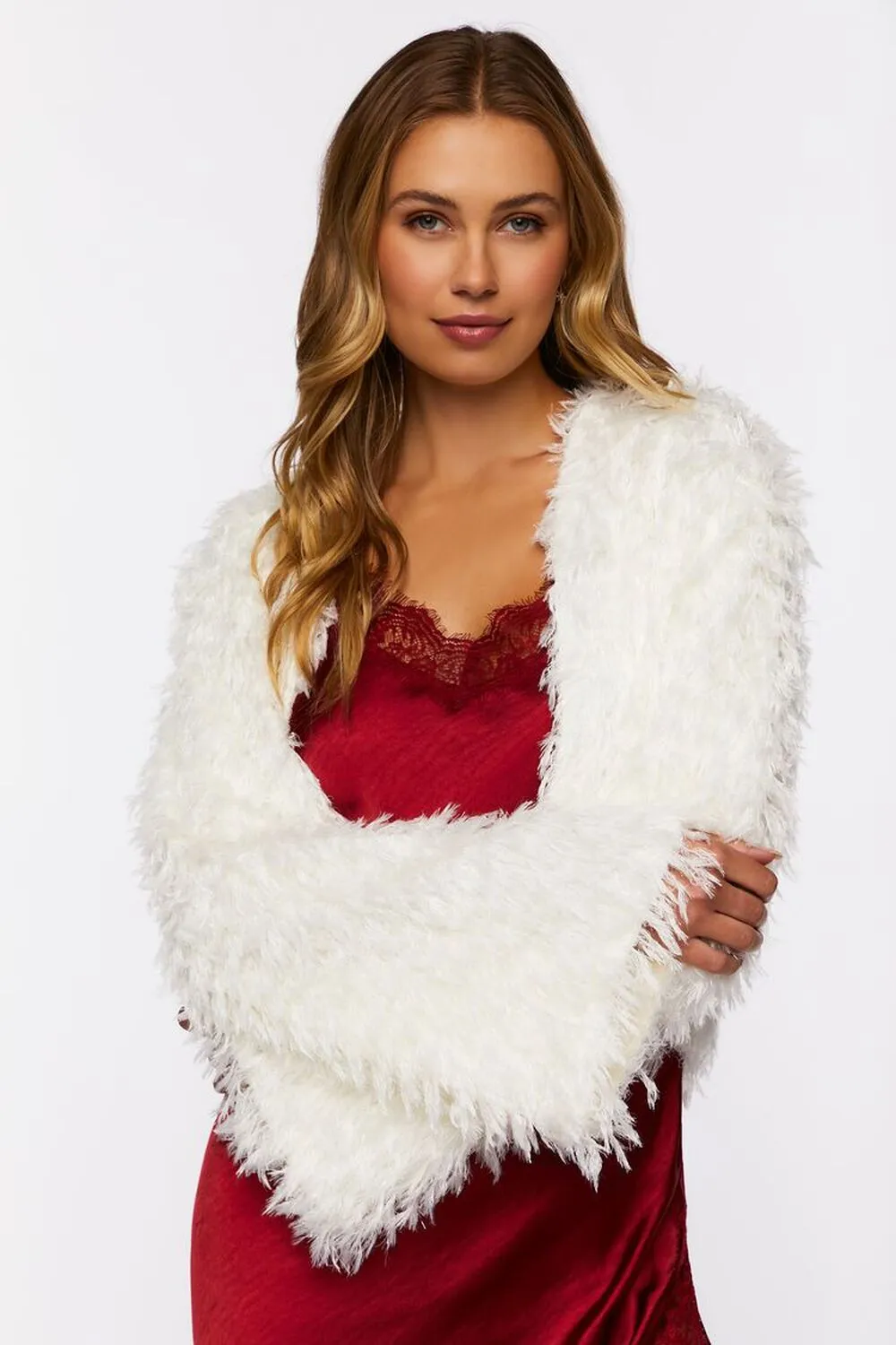 Blouson blanc court ouverte en fausse fourrure