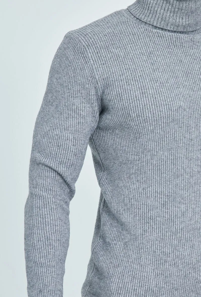 Pull col roulé maille cotelé